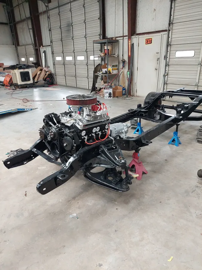 Black chassis and engine assembly