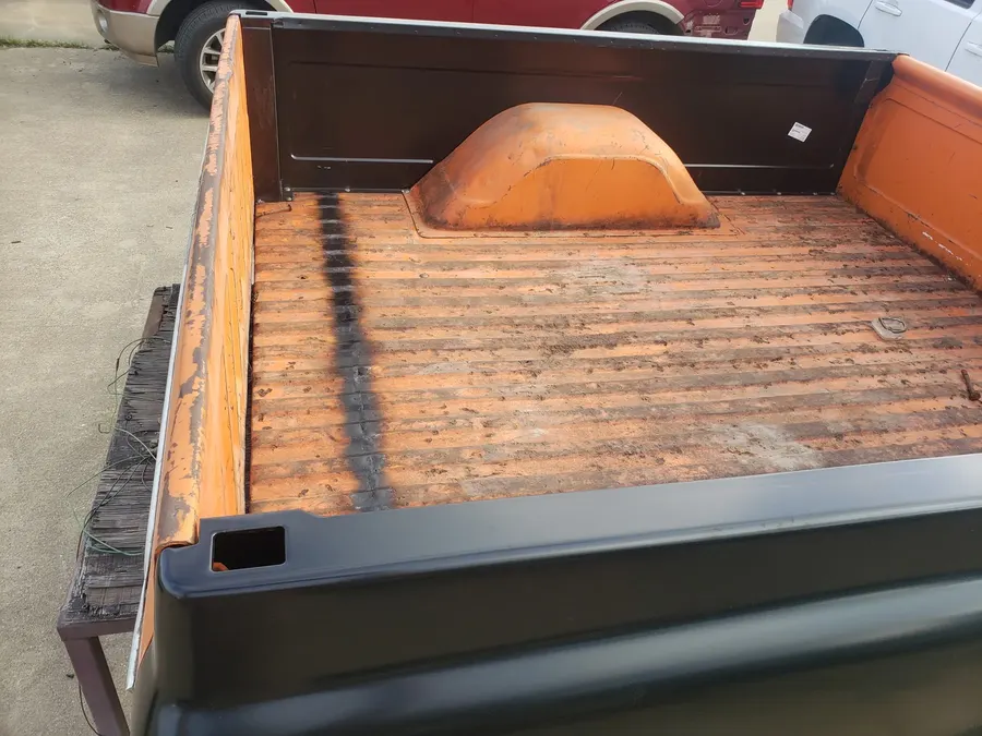 Brown truck bed with wood floor