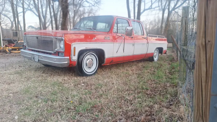 Red and white classic pickup before restoration work