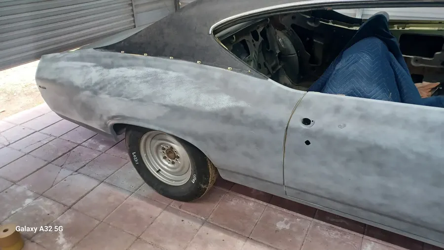Classic car side in gray primer