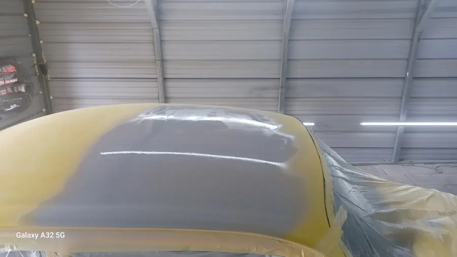 Yellow VW Beetle roof in primer