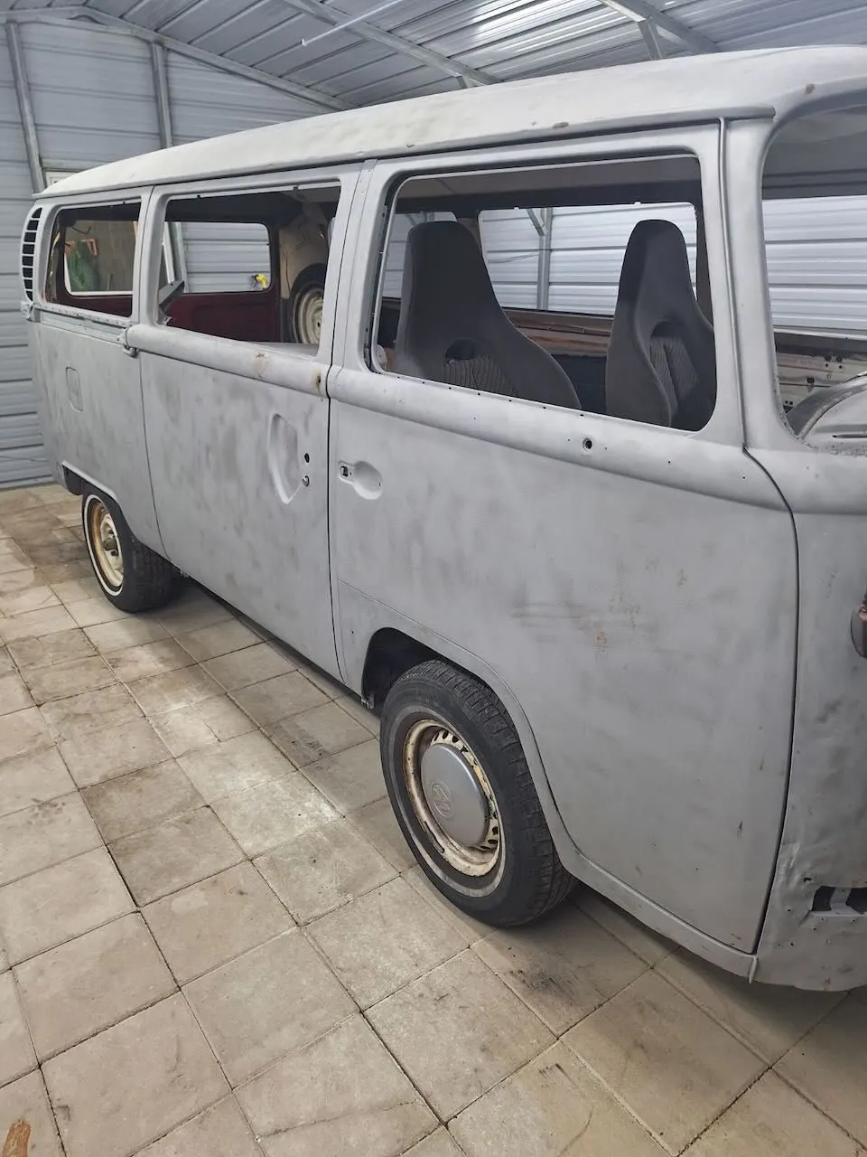 Vehicle repair progress inside the Red Barn shop