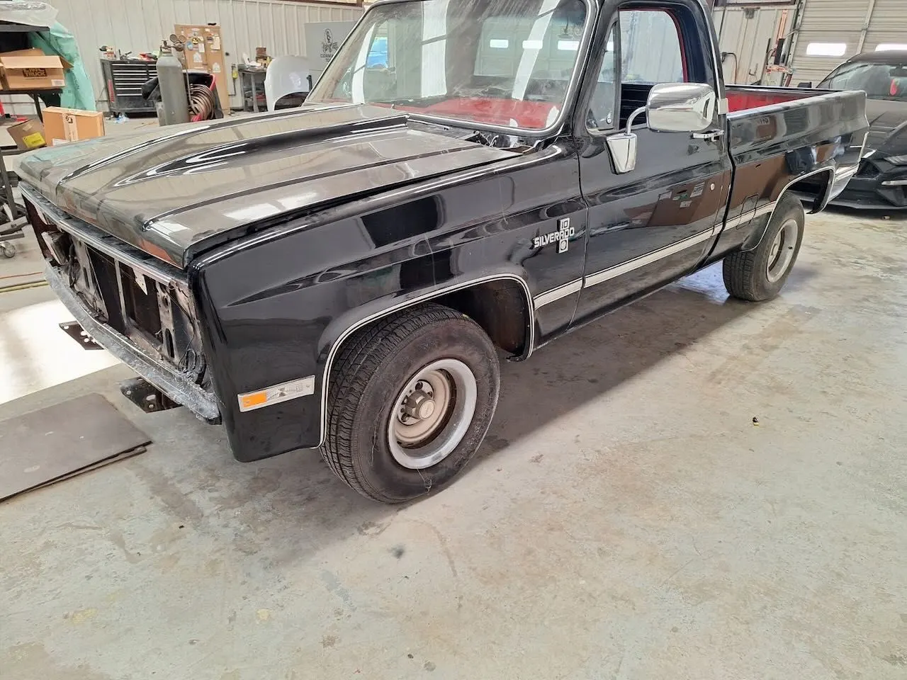 Black classic truck in the shop